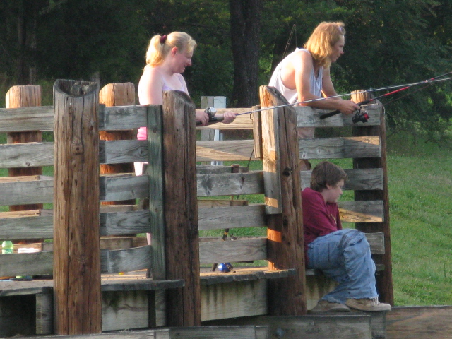 A couple of people fishing in Liberty Lake.
